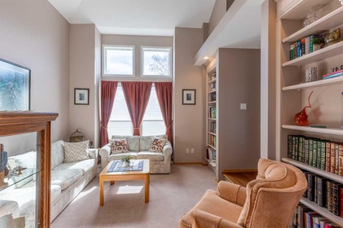 229 Coachwood Point West, Lethbridge, AB - Indoor Photo Showing Living Room With Fireplace