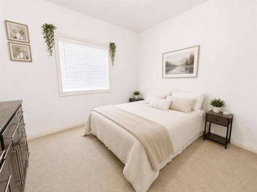 222 6A Street, Stirling, AB - Indoor Photo Showing Bedroom