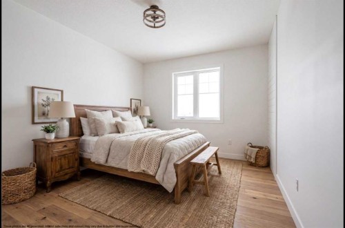 57 Malloy Terrace, Coaldale, AB - Indoor Photo Showing Bedroom