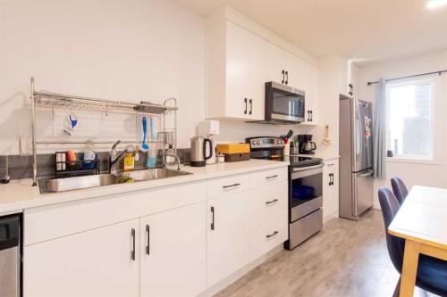 314 Uplands Boulevard North, Lethbridge, AB - Indoor Photo Showing Kitchen With Double Sink