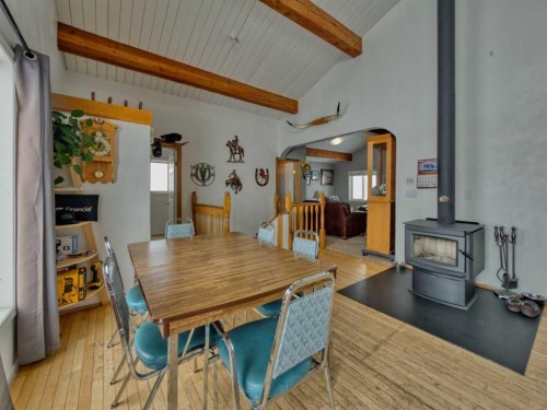 22057 Rg Rd 252, Aetna, AB - Indoor Photo Showing Dining Room With Fireplace