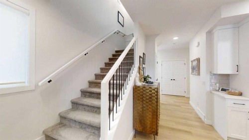 28 Aster Link, Okotoks, AB - Indoor Photo Showing Other Room