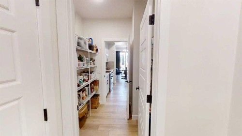 28 Aster Link, Okotoks, AB - Indoor Photo Showing Other Room