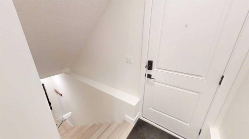 28 Aster Link, Okotoks, AB - Indoor Photo Showing Other Room
