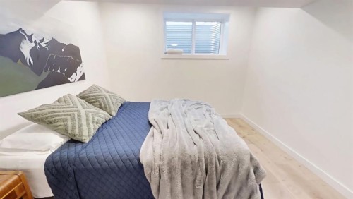 28 Aster Link, Okotoks, AB - Indoor Photo Showing Bedroom