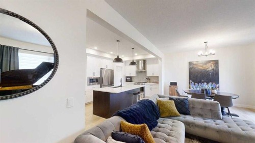 28 Aster Link, Okotoks, AB - Indoor Photo Showing Living Room