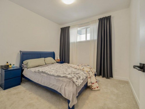 308 Uplands Boulevard North, Lethbridge, AB - Indoor Photo Showing Bedroom
