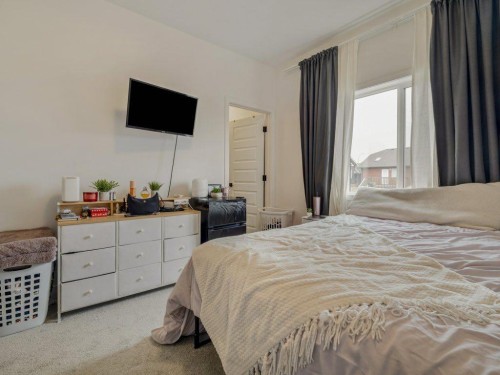 308 Uplands Boulevard North, Lethbridge, AB - Indoor Photo Showing Bedroom