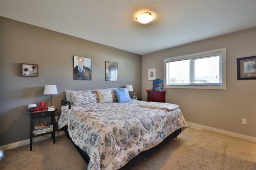 320 S 200 W, Raymond, AB - Indoor Photo Showing Bedroom