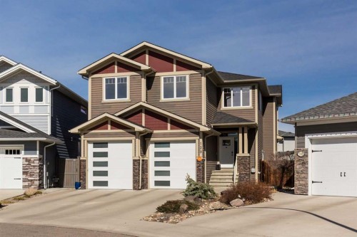 129 Sixmile Bend South, Lethbridge, AB - Outdoor With Facade