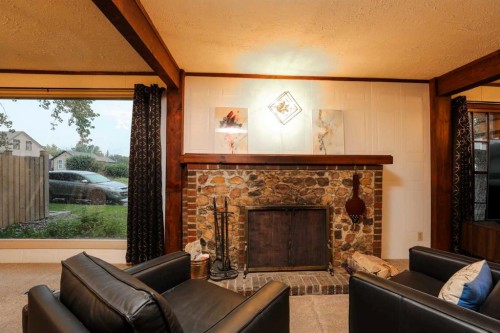 108 3 Street, Warner, AB - Indoor Photo Showing Living Room With Fireplace