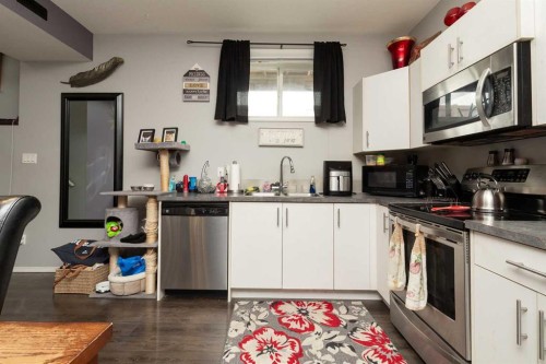 1164 Keystone Road West, Lethbridge, AB - Indoor Photo Showing Kitchen With Double Sink
