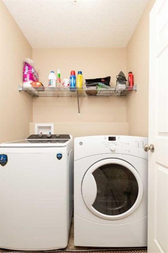 4405 Lake Drive, Coalhurst, AB - Indoor Photo Showing Laundry Room