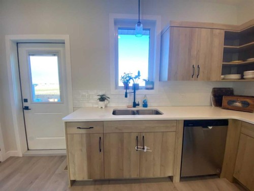 130 Prairie Gold St, Taber, AB - Indoor Photo Showing Kitchen With Double Sink