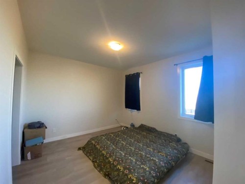 130 Prairie Gold St, Taber, AB - Indoor Photo Showing Bedroom