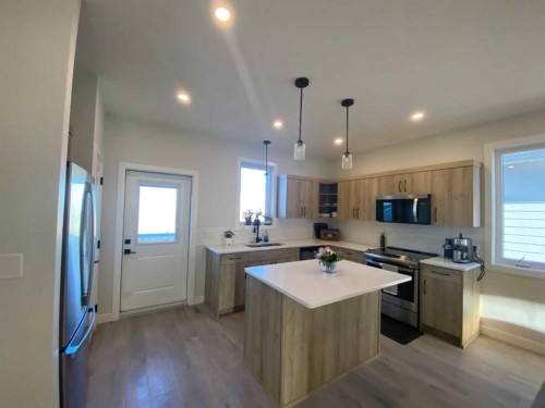 130 Prairie Gold St, Taber, AB - Indoor Photo Showing Kitchen With Double Sink With Upgraded Kitchen
