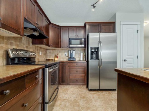 1601 Coalbanks Boulevard West, Lethbridge, AB - Indoor Photo Showing Kitchen With Stainless Steel Kitchen