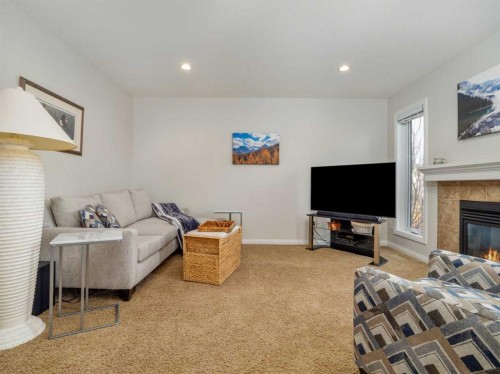 1601 Coalbanks Boulevard West, Lethbridge, AB - Indoor Photo Showing Living Room With Fireplace