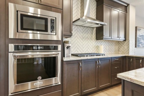 370 Magnolia Heath Se, Calgary, AB - Indoor Photo Showing Kitchen With Upgraded Kitchen