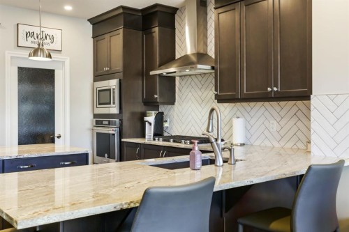 370 Magnolia Heath Se, Calgary, AB - Indoor Photo Showing Kitchen With Upgraded Kitchen