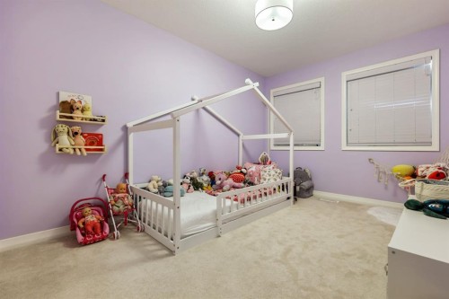 370 Magnolia Heath Se, Calgary, AB - Indoor Photo Showing Bedroom
