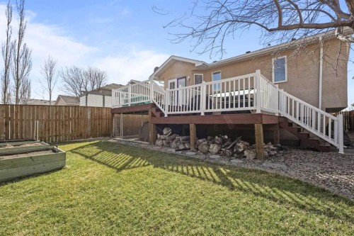 41 Heritage Circle West, Lethbridge, AB - Outdoor With Deck Patio Veranda