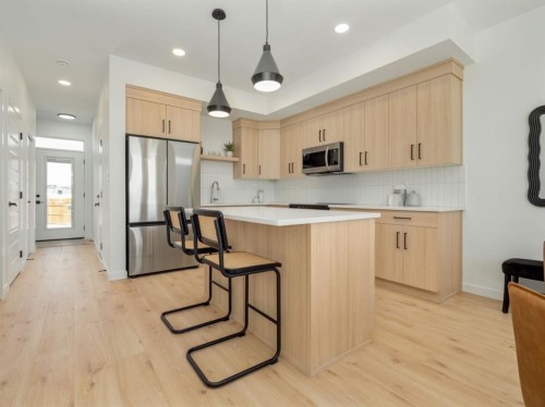 661 Blackwolf Boulevard North, Lethbridge, AB - Indoor Photo Showing Kitchen With Stainless Steel Kitchen