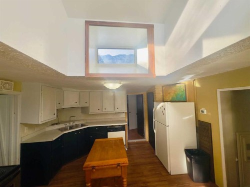 15030 21 Aveunue, Frank, AB - Indoor Photo Showing Kitchen With Double Sink