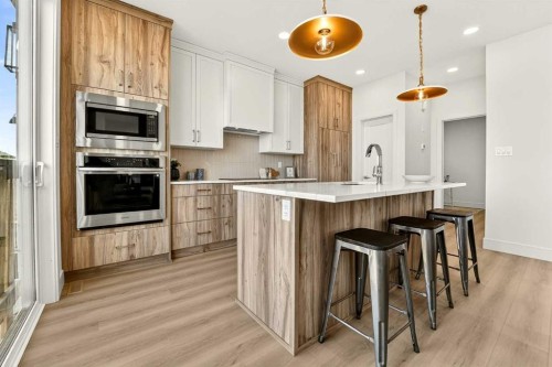 63 Miners Road West, Lethbridge, AB - Indoor Photo Showing Kitchen With Upgraded Kitchen