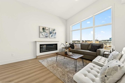 63 Miners Road West, Lethbridge, AB - Indoor Photo Showing Living Room With Fireplace