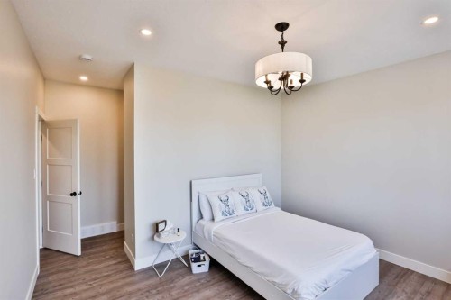 311 S 100 W, Raymond, AB - Indoor Photo Showing Bedroom