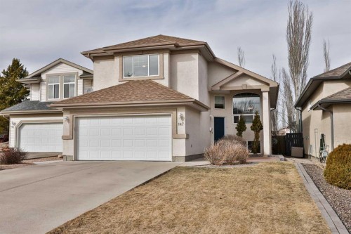 147 Heritage Circle West, Lethbridge, AB - Outdoor With Facade