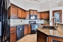 147 Heritage Circle West, Lethbridge, AB  - Indoor Photo Showing Kitchen With Double Sink 
