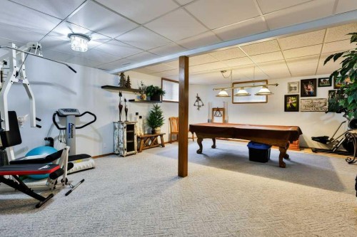 4615 60 Avenue, Taber, AB - Indoor Photo Showing Gym Room