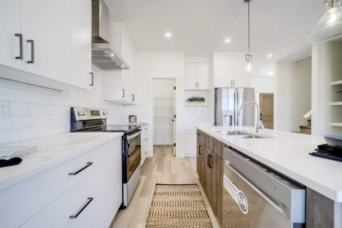 393 Rivergrove Chase West, Lethbridge, AB - Indoor Photo Showing Kitchen With Double Sink With Upgraded Kitchen