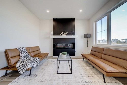 393 Rivergrove Chase West, Lethbridge, AB - Indoor Photo Showing Living Room With Fireplace