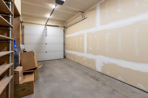 5-418 Highlands Boulevard West, Lethbridge, AB - Indoor Photo Showing Garage