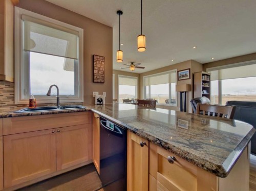5 Walking Plow Estates, Cowley, AB - Indoor Photo Showing Kitchen With Double Sink