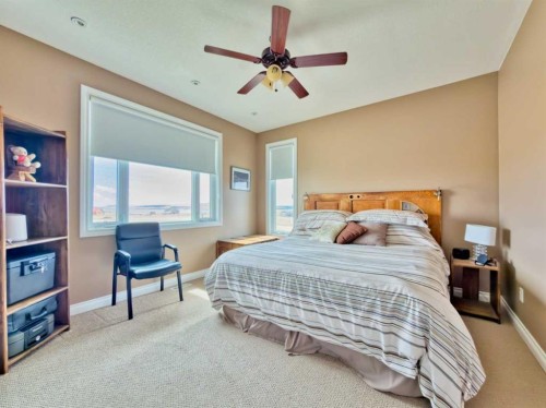 5 Walking Plow Estates, Cowley, AB - Indoor Photo Showing Bedroom