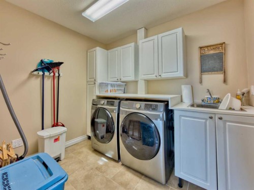 5 Walking Plow Estates, Cowley, AB - Indoor Photo Showing Laundry Room