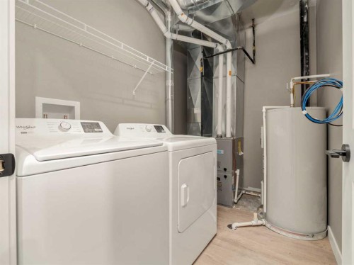 43 Prairie Lake Drive, Taber, AB - Indoor Photo Showing Laundry Room