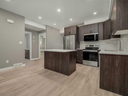 43 Prairie Lake Drive, Taber, AB - Indoor Photo Showing Kitchen With Upgraded Kitchen