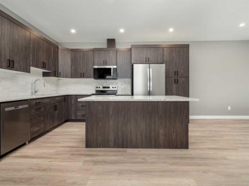 43 Prairie Lake Drive, Taber, AB - Indoor Photo Showing Kitchen With Upgraded Kitchen