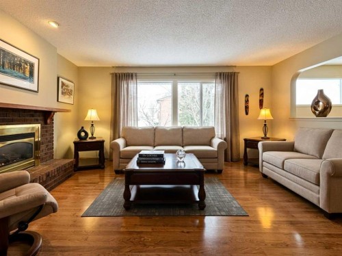 2409 20 Street North, Lethbridge, AB - Indoor Photo Showing Living Room With Fireplace