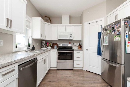 1 Edgemoor Way West, Lethbridge, AB - Indoor Photo Showing Kitchen With Stainless Steel Kitchen
