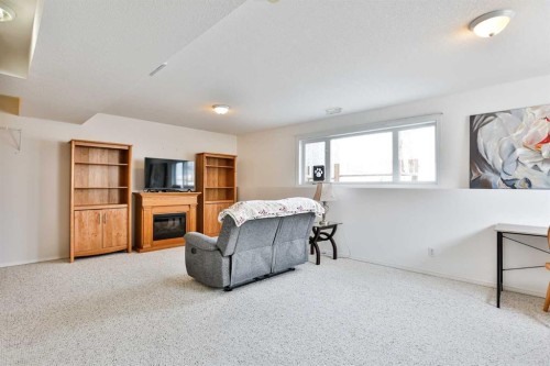 289 Cougar Way North, Lethbridge, AB - Indoor With Fireplace
