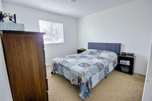 5111 54 Street, Taber, AB - Indoor Photo Showing Bedroom