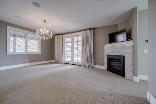 224010 Twp Rd 9-2, Rural Lethbridge County, AB - Indoor Photo Showing Other Room With Fireplace