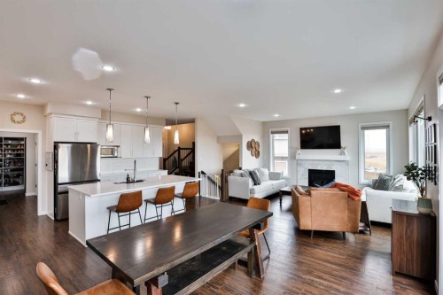 261 Agnes Short Place North, Lethbridge, AB - Indoor With Fireplace