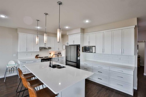261 Agnes Short Place North, Lethbridge, AB - Indoor Photo Showing Kitchen With Double Sink With Upgraded Kitchen